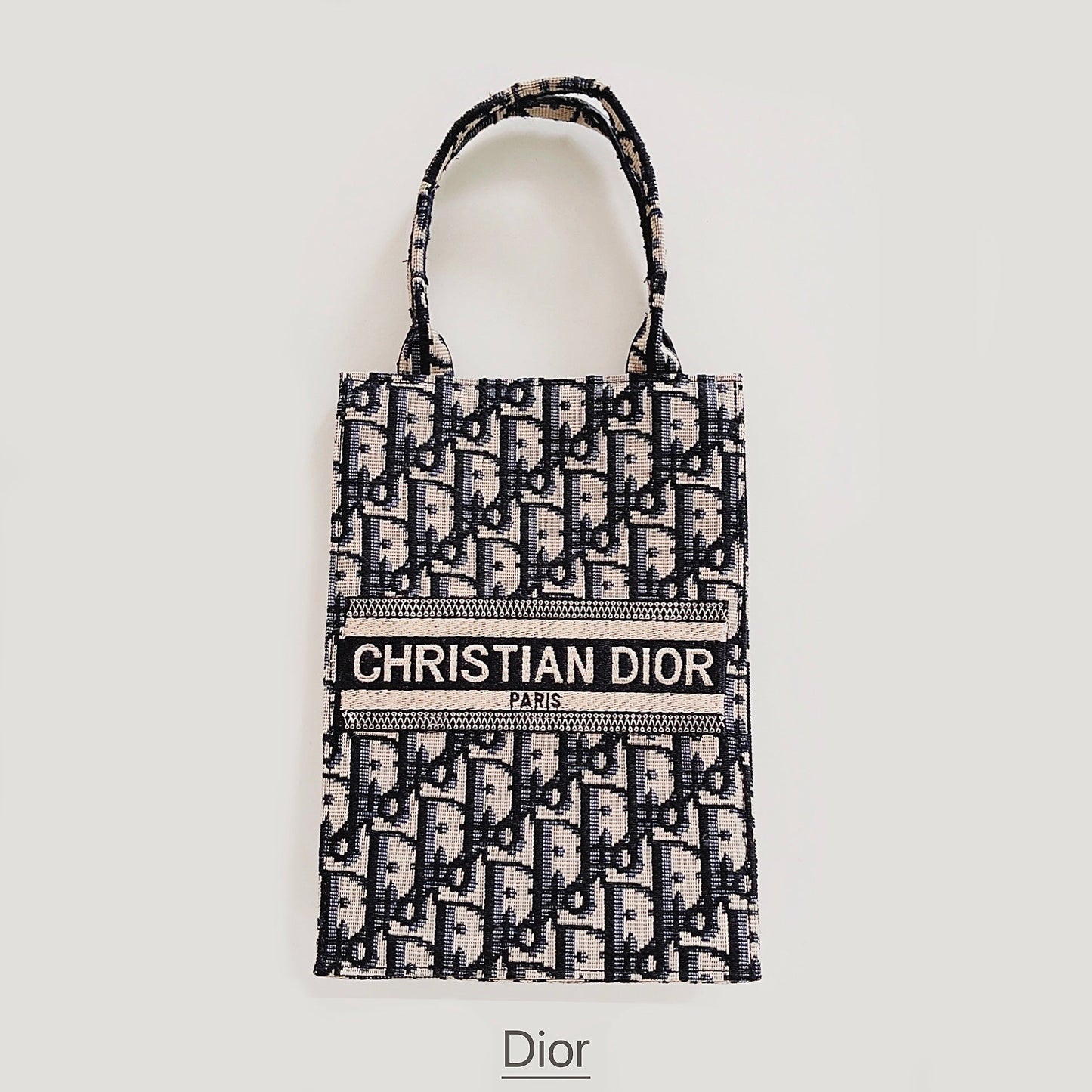 Klassisk totepose med stropp for crossbody