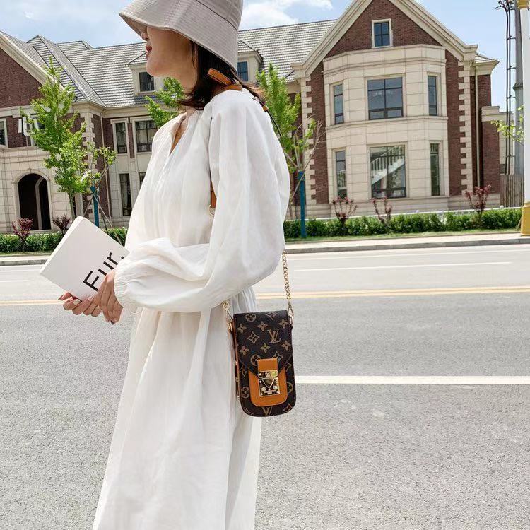 Crossbody skinn telefonpose