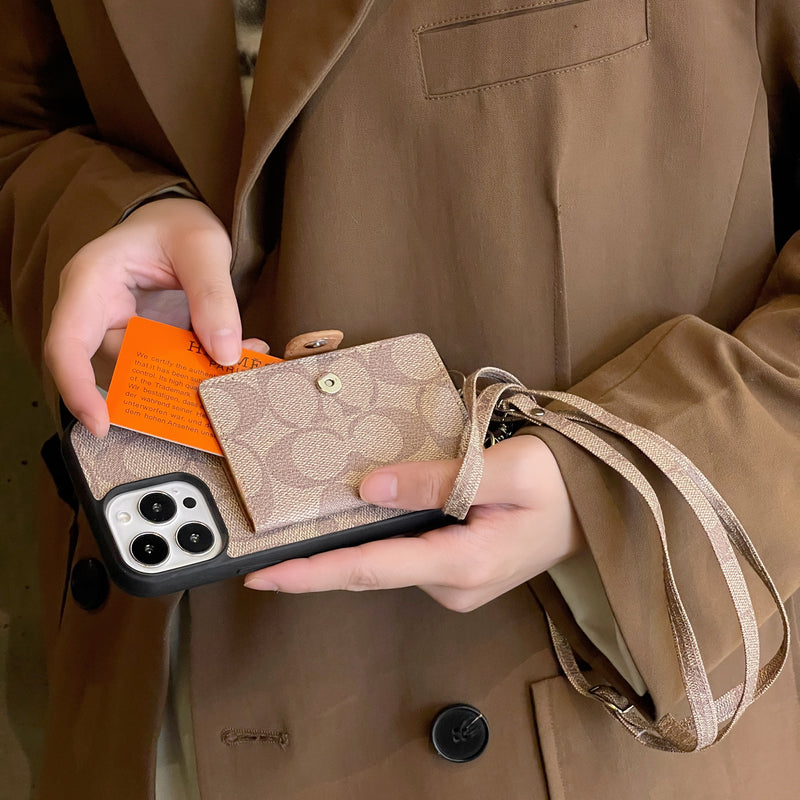 Custodia per iPhone Coach con portafoglio e cinturino bianco -szk240402