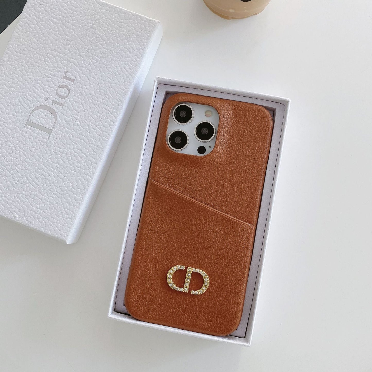 CD skórzana obudowa iPhone'a
