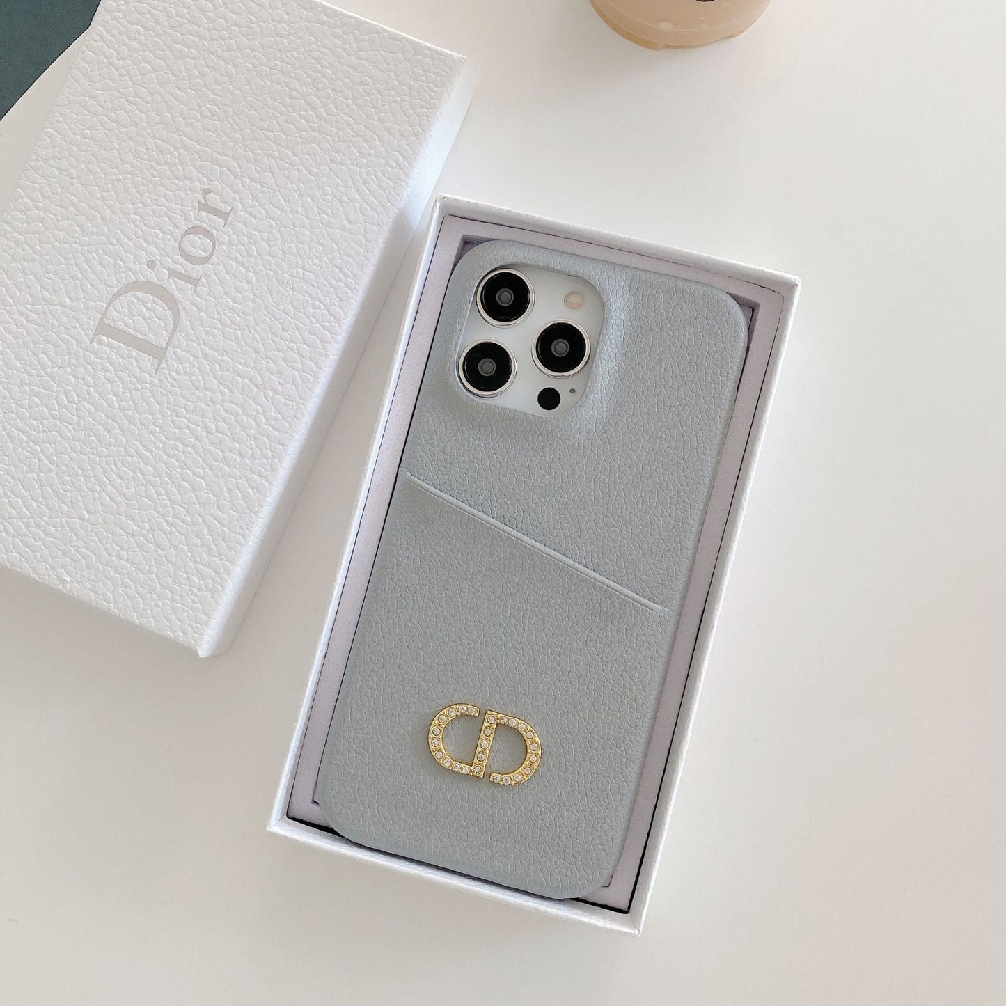 CD skórzana obudowa iPhone'a