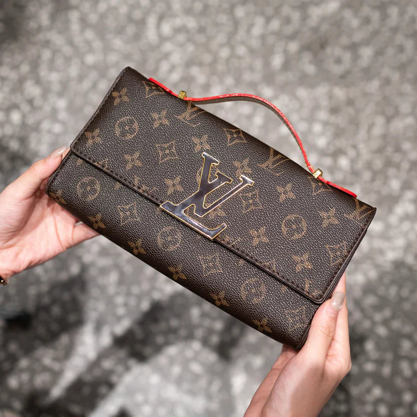 Luxe tekstur skinnhåndveske
