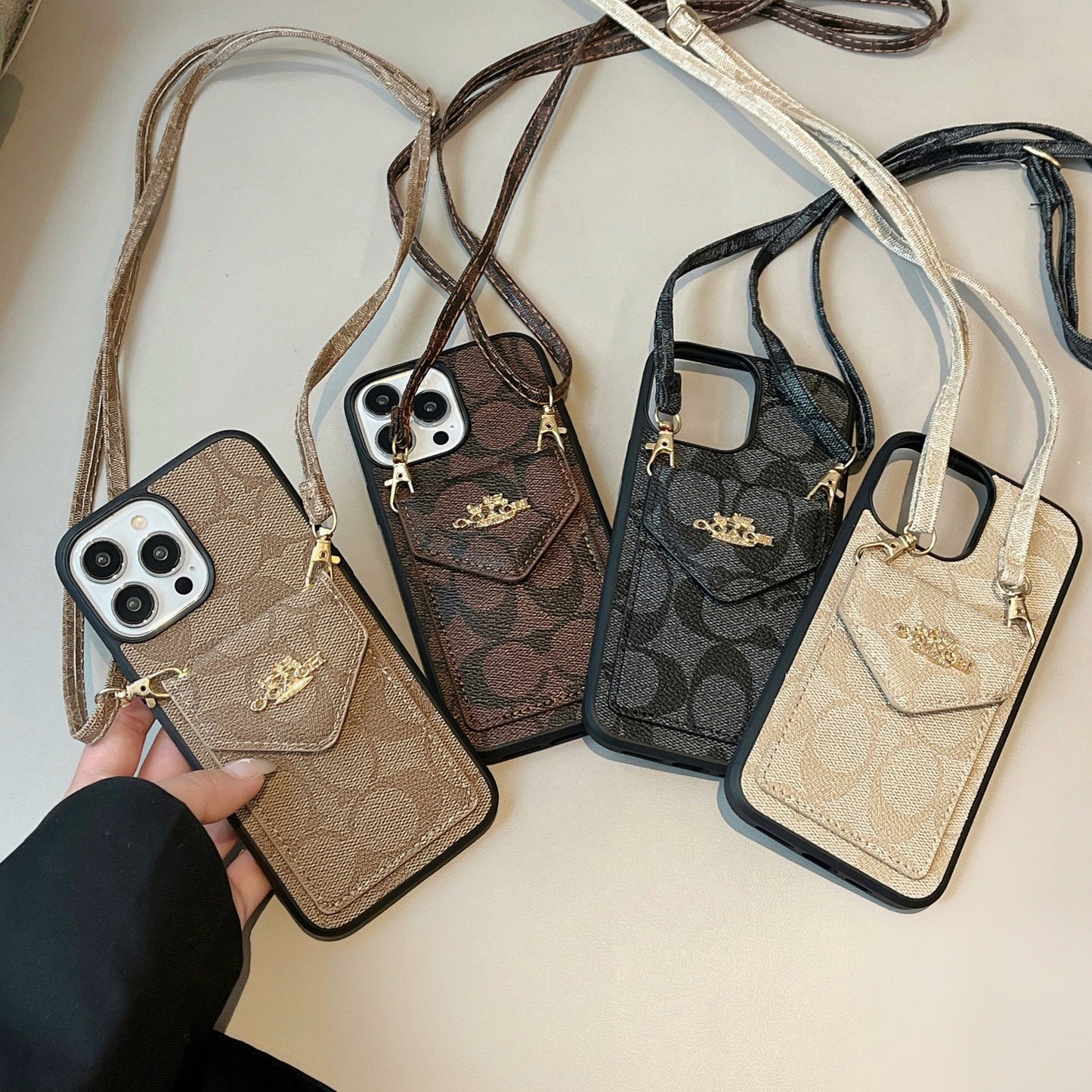 Coach iPhone Hülle mit Kartenhalter und Gurt dunkelbraun -sj240513