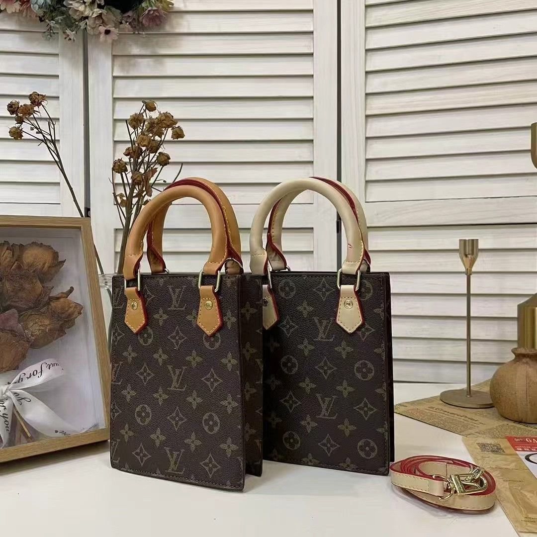 Klassisk totepose med stropp for crossbody