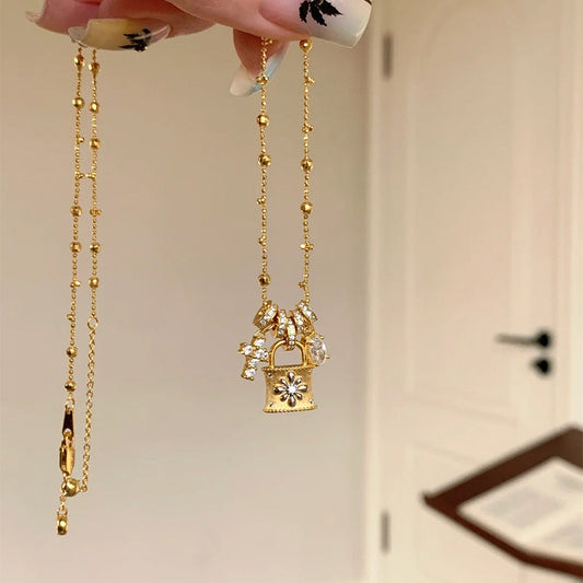 Elegant Cross & Lock Pendant Necklace - Lindy Gold Chain with Crystal Charms