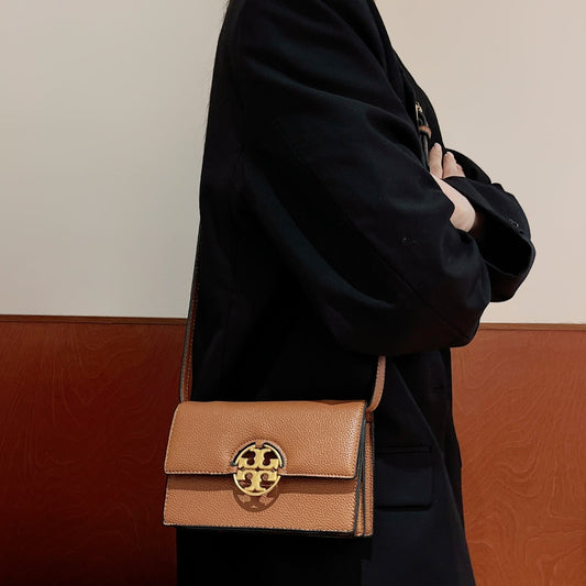 Crossbody skinnveske