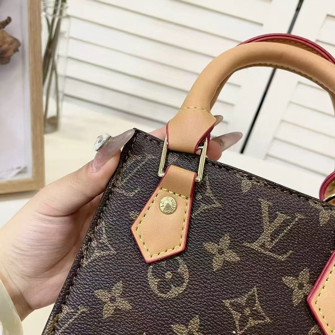 Klassisk totepose med stropp for crossbody