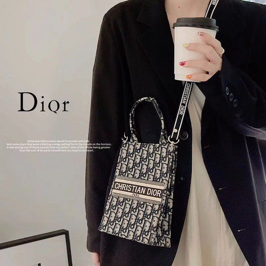 Klassisk totepose med stropp for crossbody
