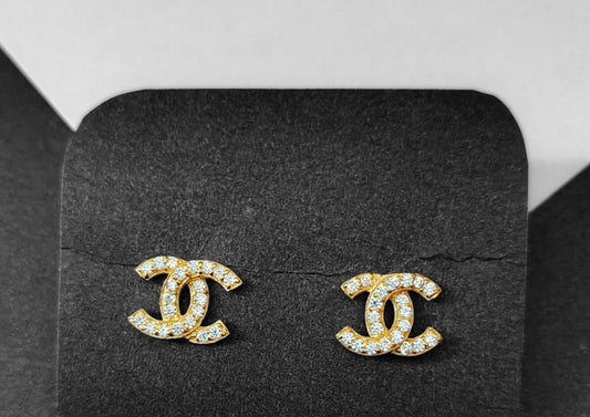 Doppel -C -Logo -Bolzen mit Zirkonias Goldton